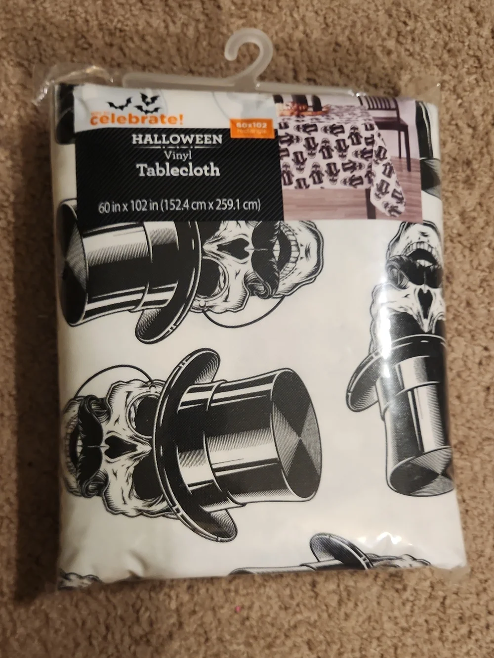 Brand new Halloween Vinyl Tablecloth. White with Black Skull & Top Hat Pattern